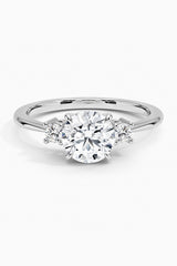 Round Moissanite Three Stone Engagement Ring