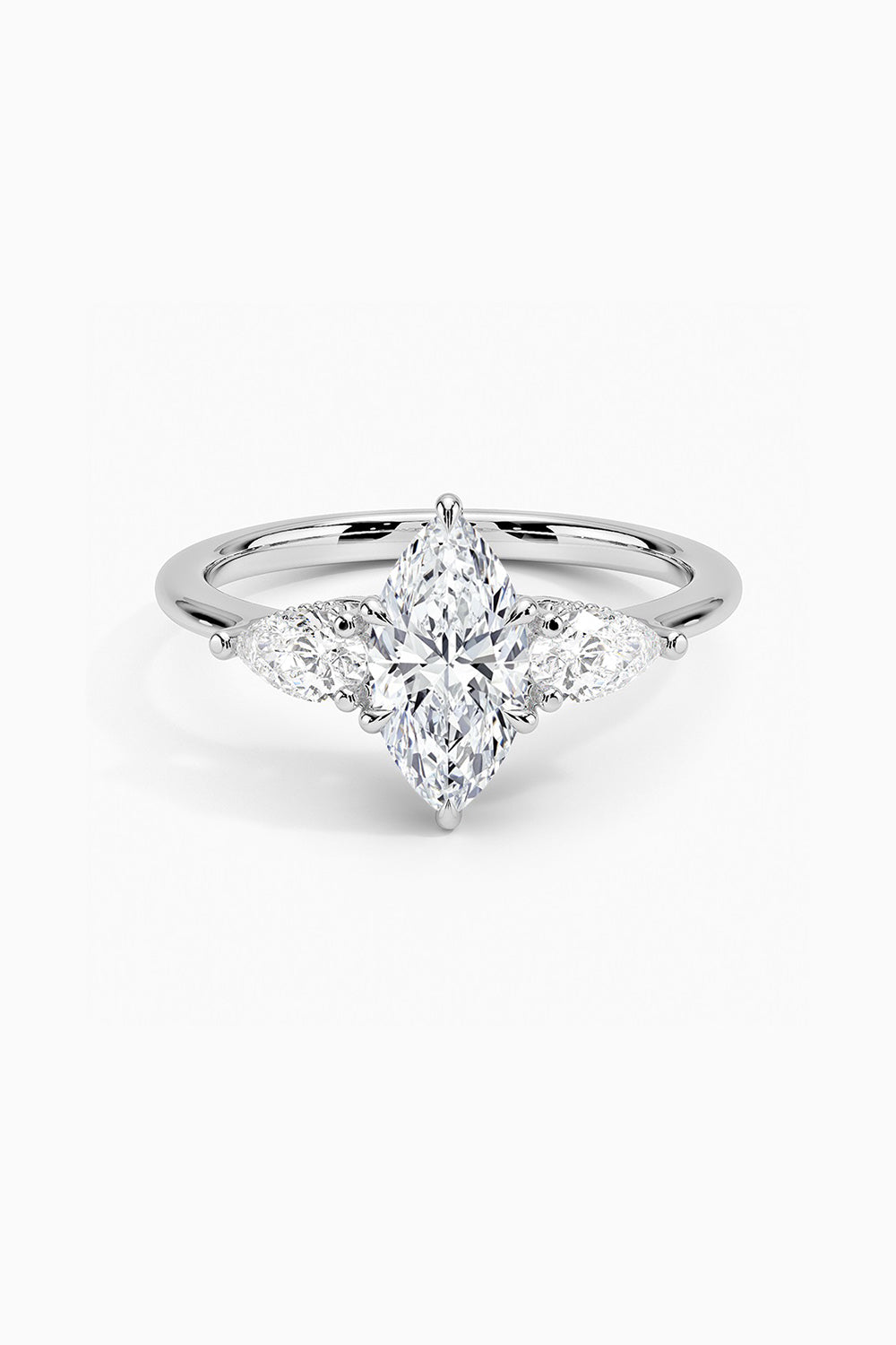 Pear And Marquise Shape Moissanite Three Stone Ring