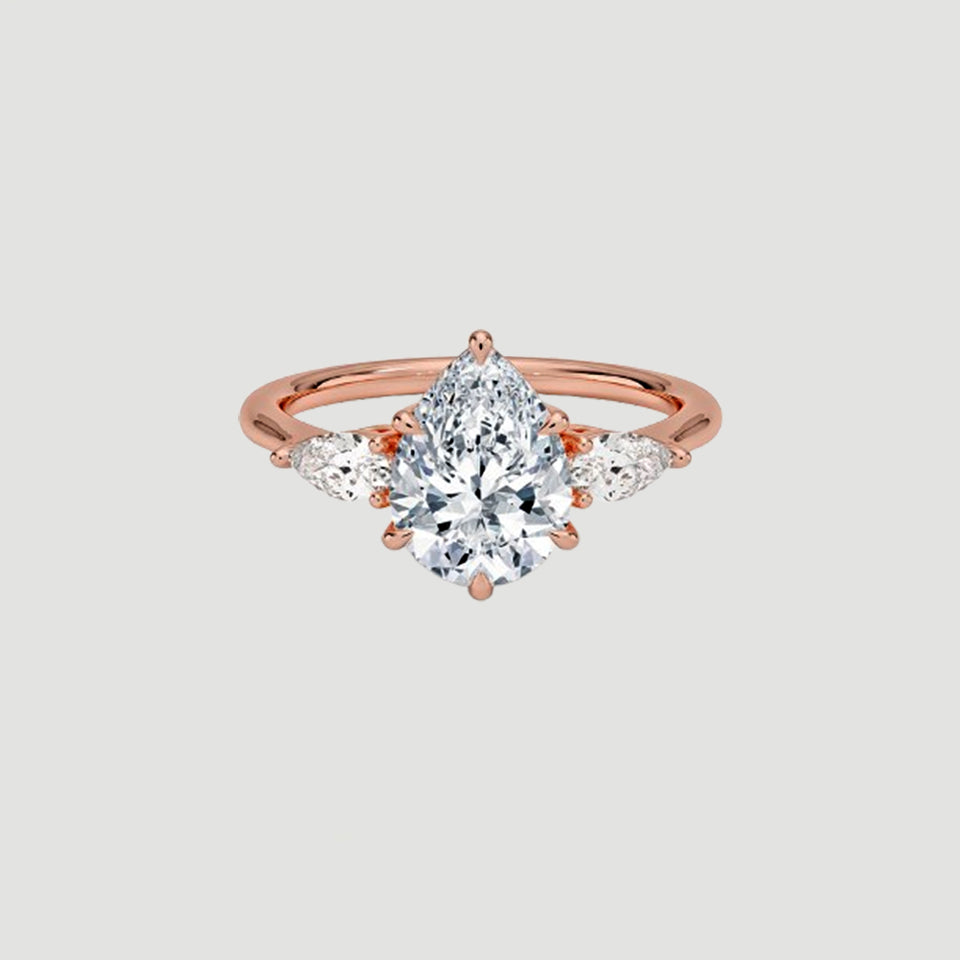 Moissanite Pear Three Stone Ring