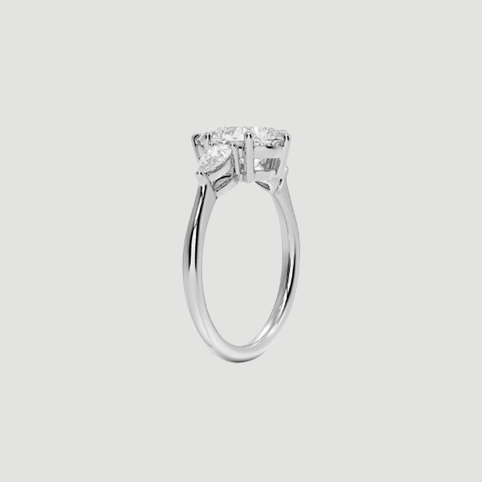 Moissanite Pear Three Stone Ring