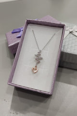 Two Tone Heartbeat Pendant Necklace